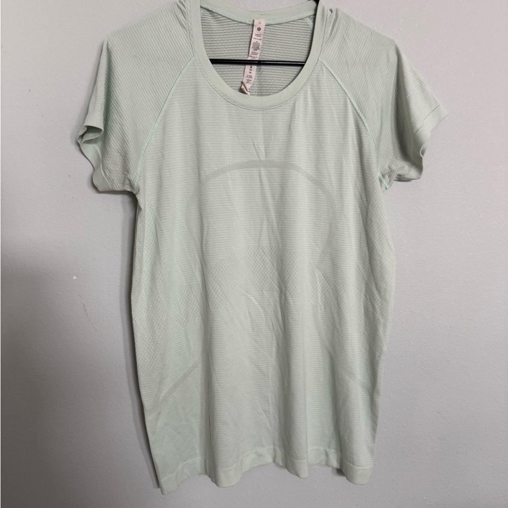 Women's lululemon Women's Swiftly Tech Short Sleeve Shirt 2.0 in a light green